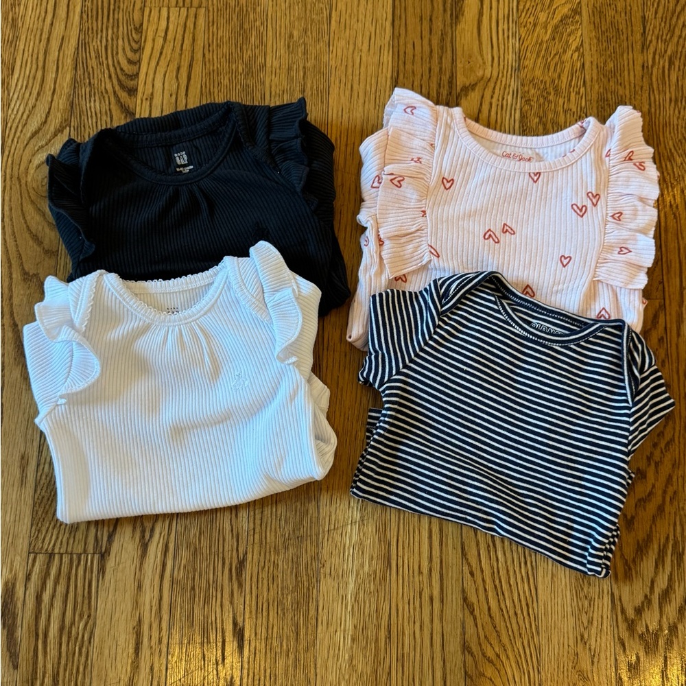 Set of 4 long sleeved bodysuit / onesies - good preowned condition - 12-18M